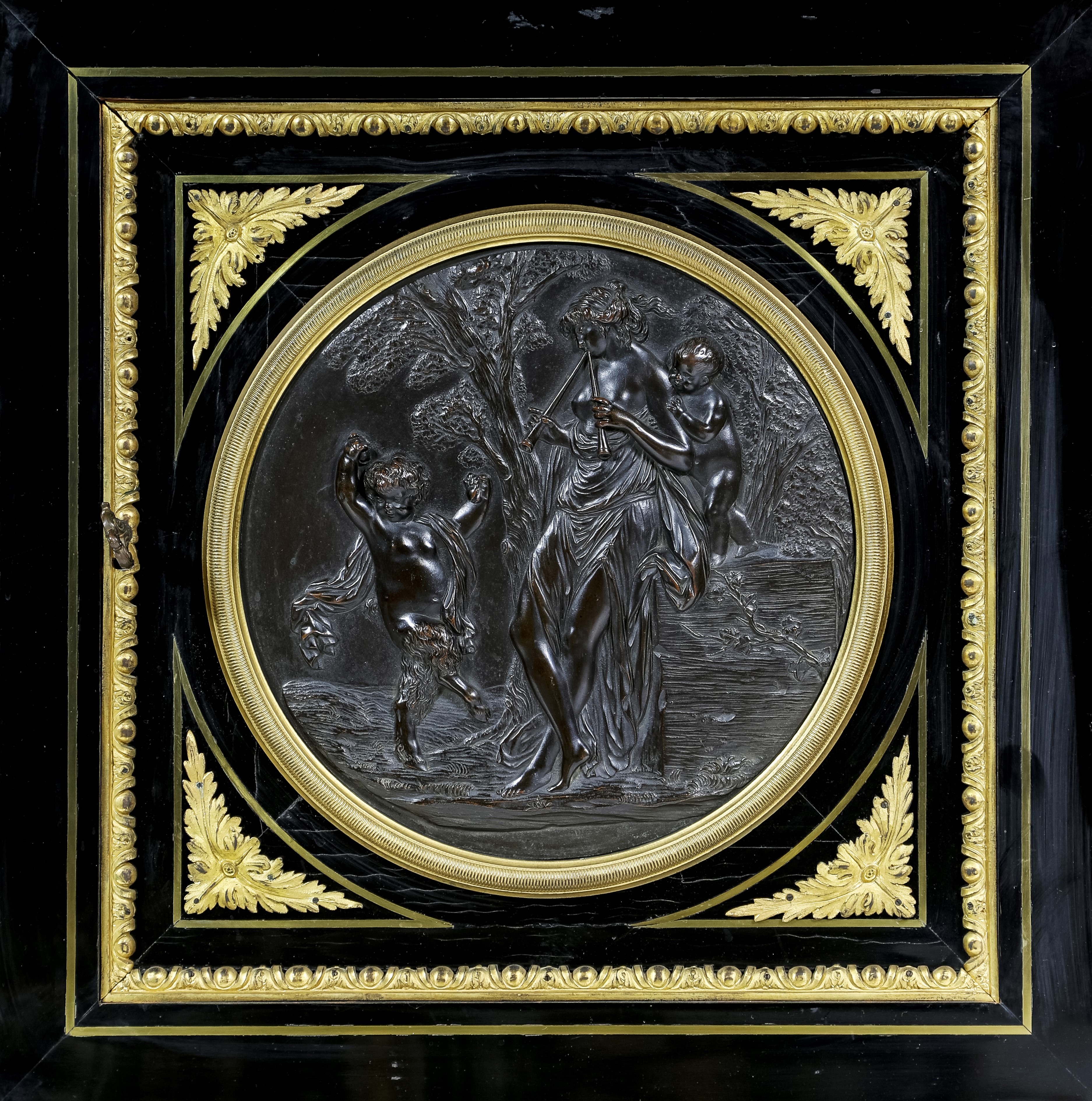 Coppia di piccole credenze in legno ebanizzato con ricca ornamentazione di bronzi e placche in co...