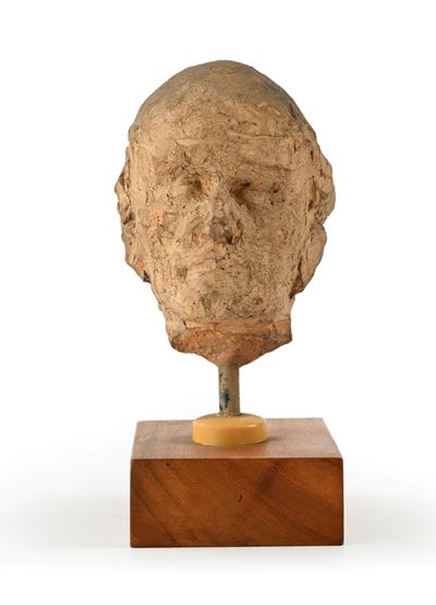 Testina in terracotta, piccola scultura su base in legno