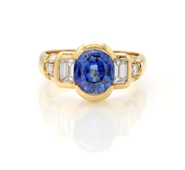 Anello in oro, zaffiro, brillanti e baguettes