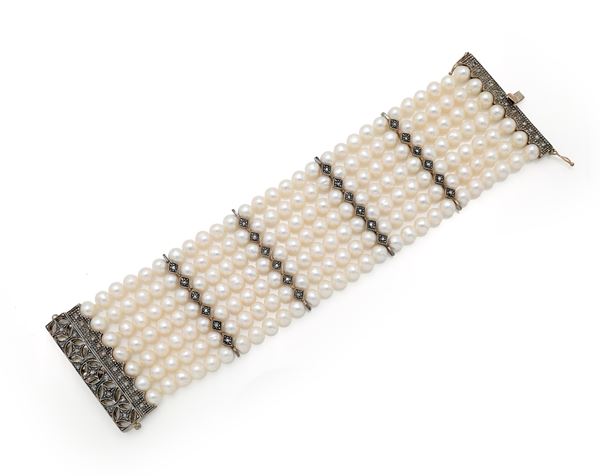 Bracciale in oro, perle, argento e diamanti