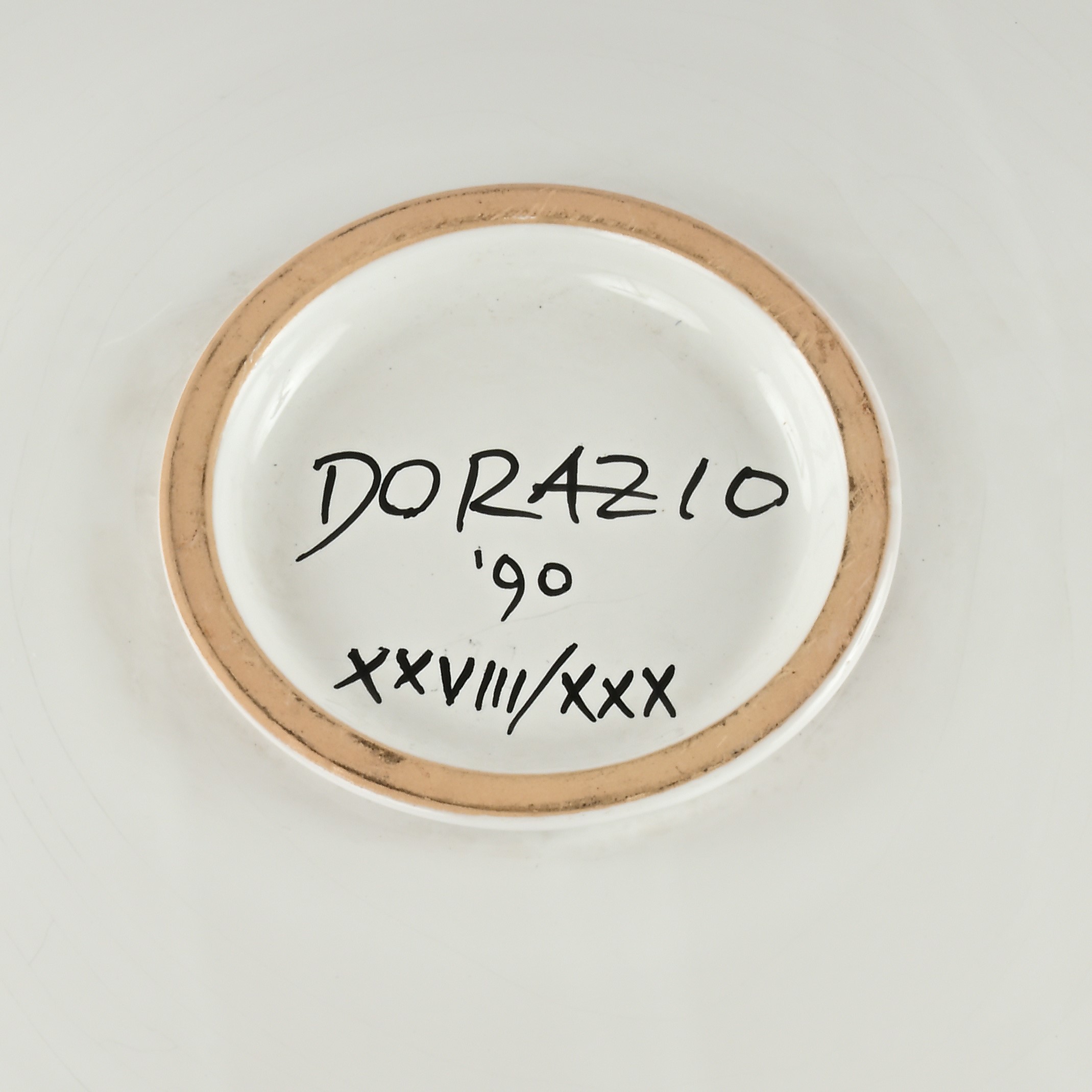 Piatto in ceramica smaltata e dipinta