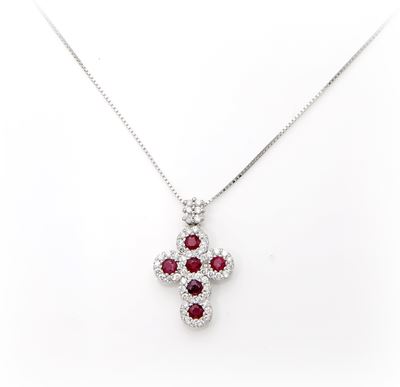 Pendente a croce in oro bianco 750/000 con rubini e brillanti