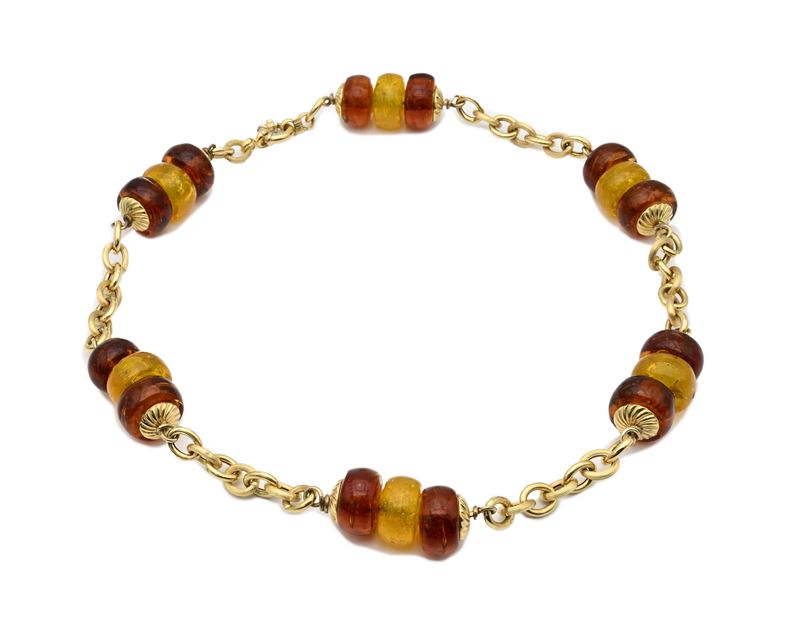 Collana in oro 750/000 e pasta vitrea