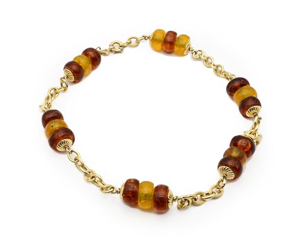 Collana in oro e pasta vitrea