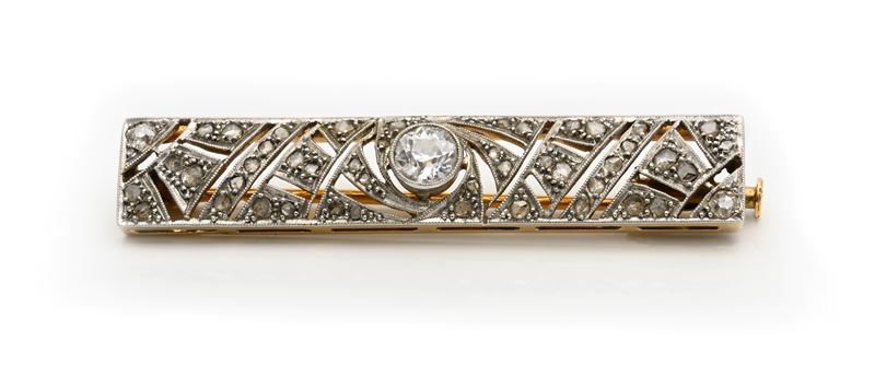 Spilla a barretta in oro bianco 750/000 con diamante rotondo brillante