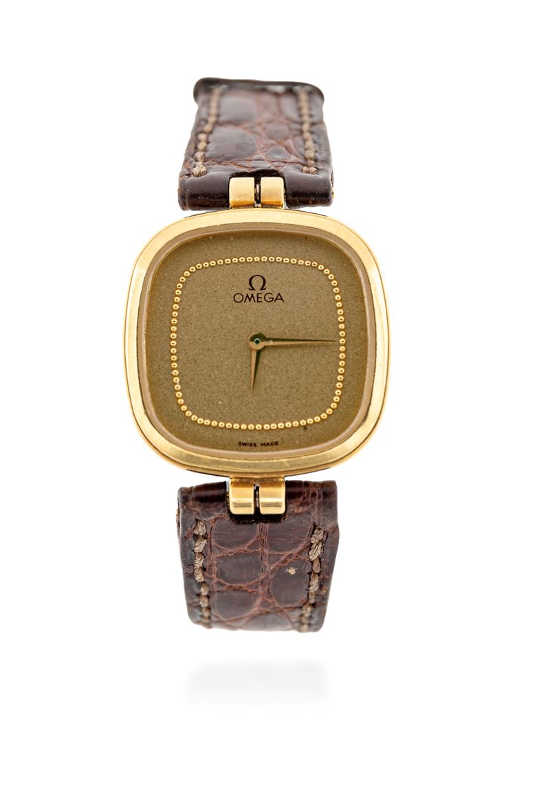 Omega testa oro