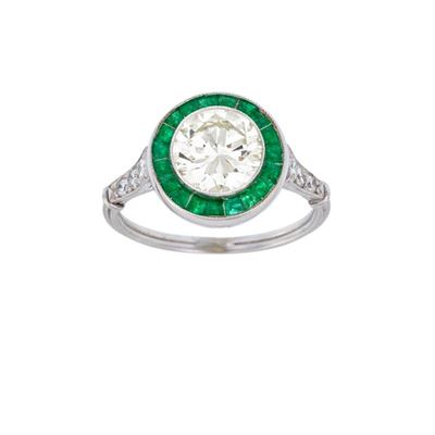 Anello in Oro Bianco con Brillante e Smeraldi