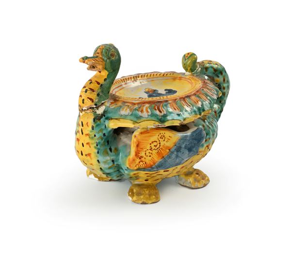 Versatoio zoomorfo porta unguento in maiolica gialla, verde e bruno