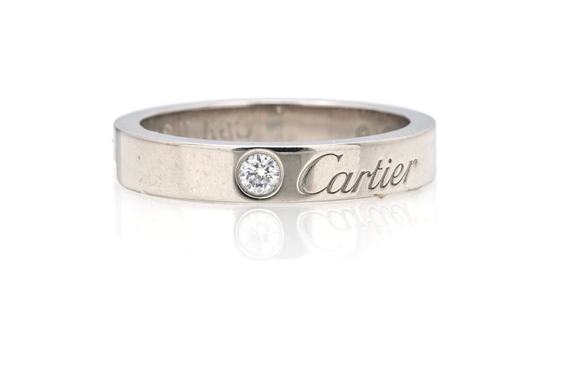 Cartier, fede in platino e brillante