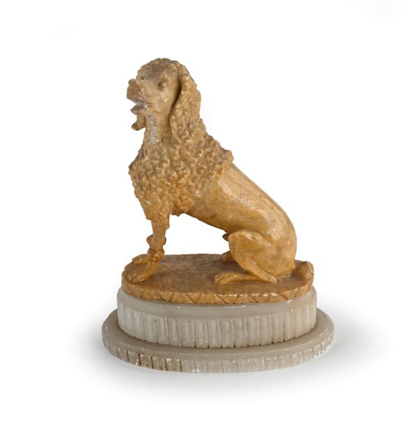 Breton Epagneul in alabastro a patina ambrata, seconda metà del XIX secolo