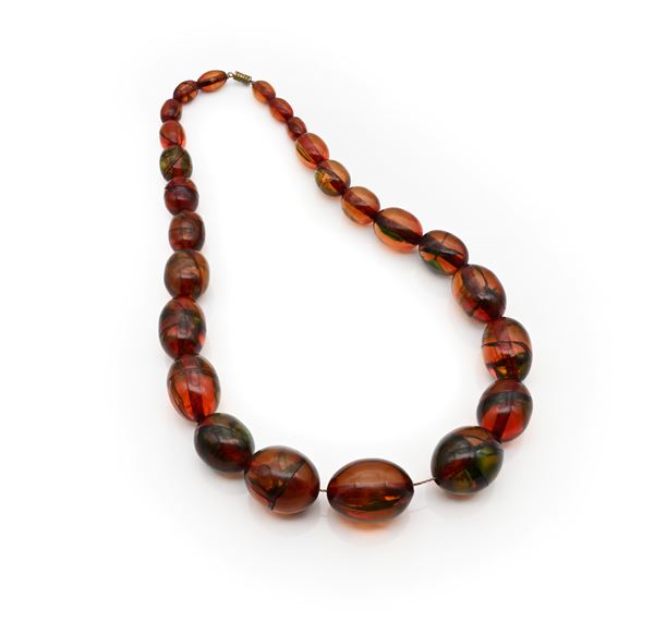 Collana in ambra e metallo
