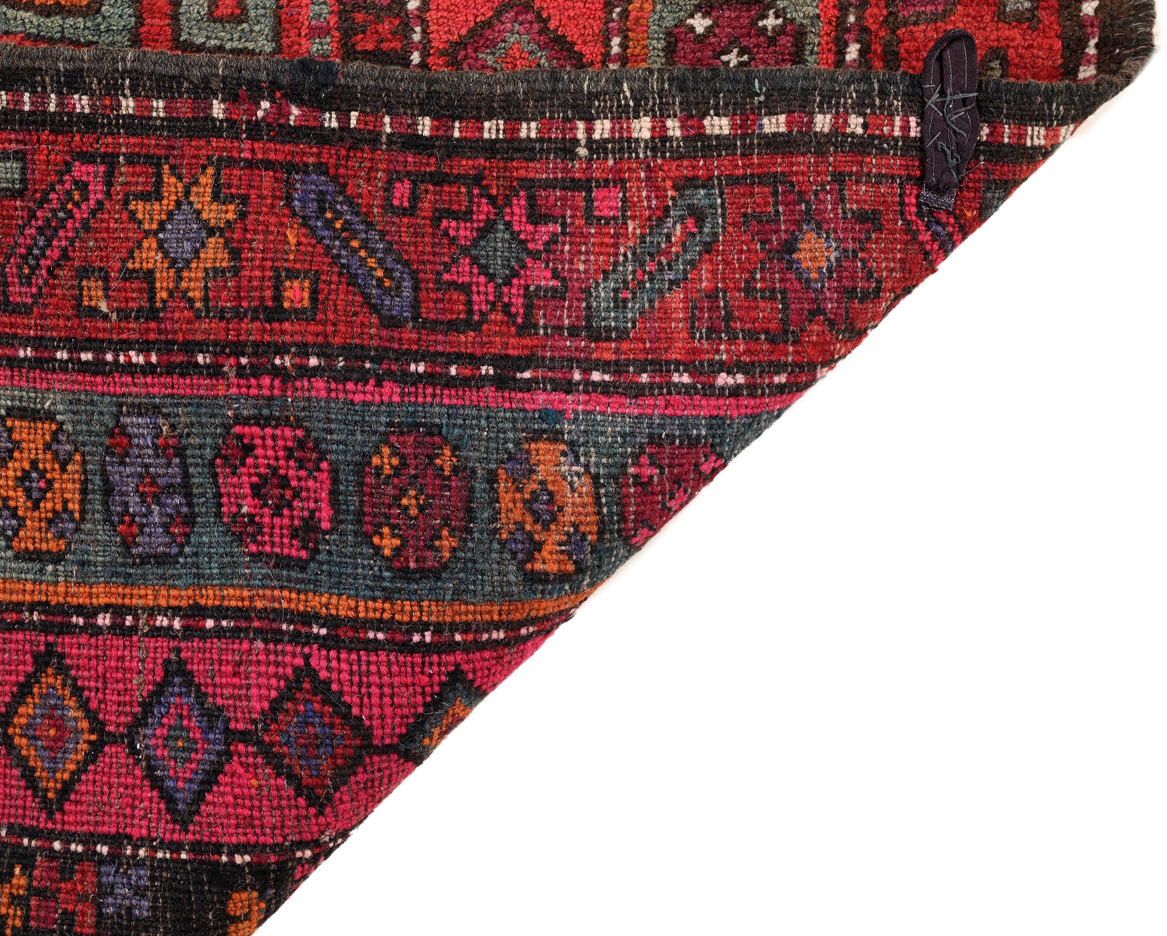 Guida Shiraz fondo rosso con sette medaglioni