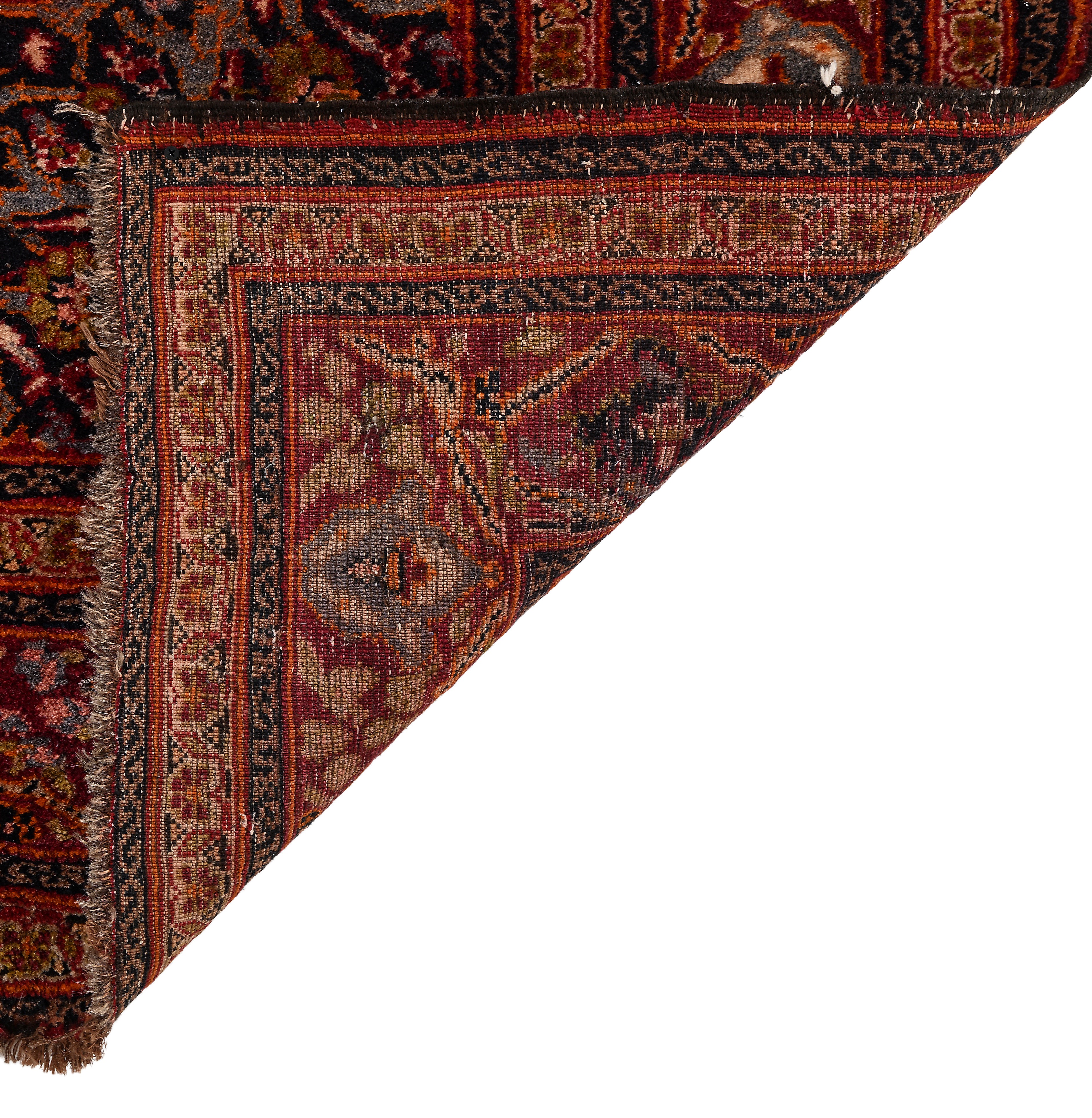 Tappeto persiano Kashan fondo rosso rubino con rosone centrale, XX secolo