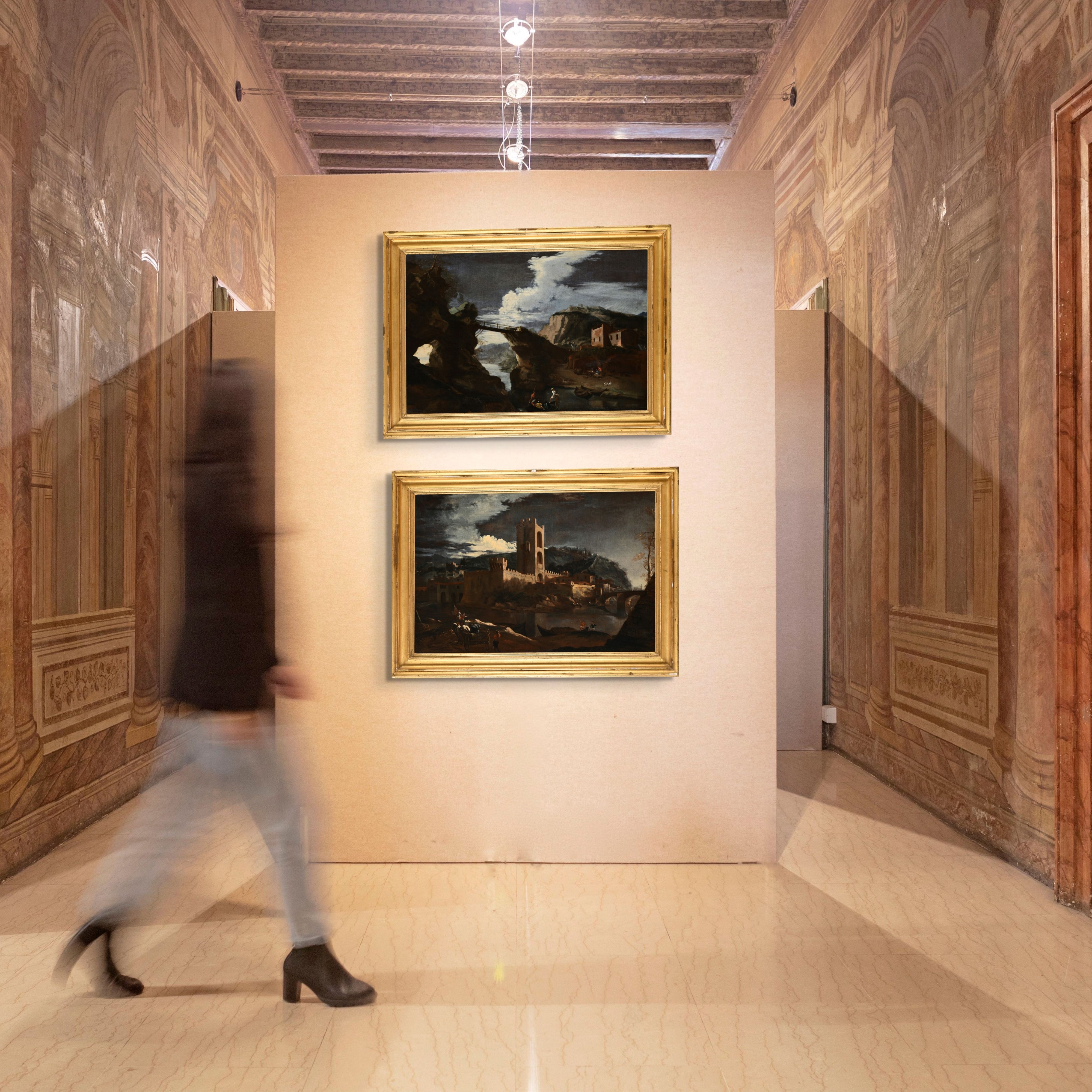 Salvator Rosa - Paesaggi fluviali con castello, ponte e borgo antico (coppia di olii su tela)