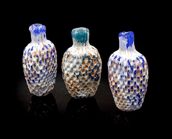 Lotto di tre bocciette in vetro di Murano modello Scavo