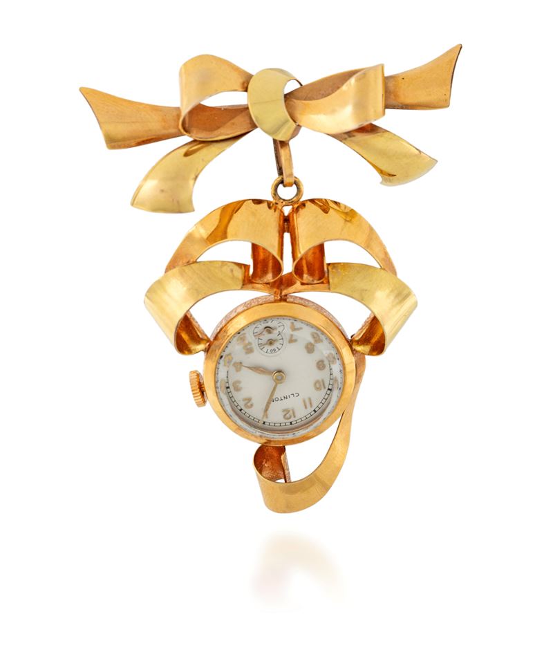 Spilla in oro con orologio pendente