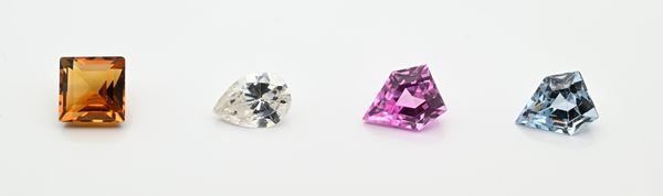 Lotto di topazi, zircone e quarzo rosa in taglio fantasia