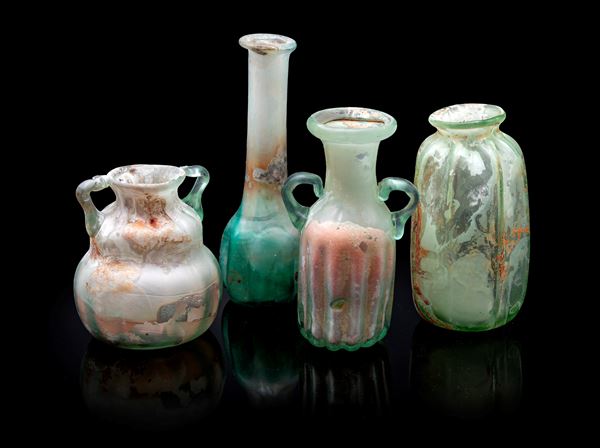 Lotto di quattro vasi in verdo di Murano modello Scavo