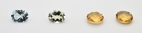 Lotto di quattro topazi e quarzi