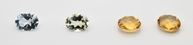 Lotto di quattro topazi e quarzi