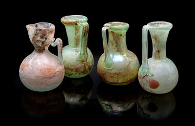 Vetreria Cenedese, Quattro brocche in vetro di Murano (modello Scavo), tre verde acqua e una bian...