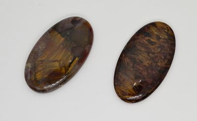Coppia di calcedonio multicolor (pietrersite), taglio ovale
