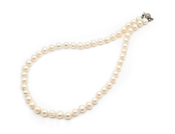 Collana di perle ed oro.