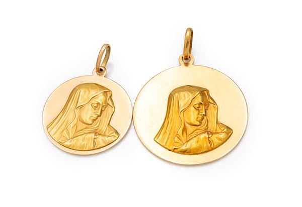 Coppia di pendenti sacri in oro