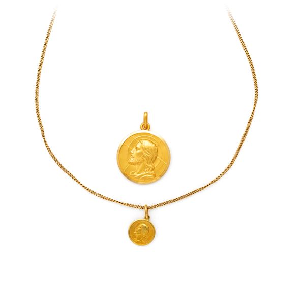 Catena e coppia di pendenti sacri in oro