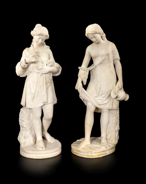 Coppia di sculture in marmo bianco raffiguranti Flora ed Ebe