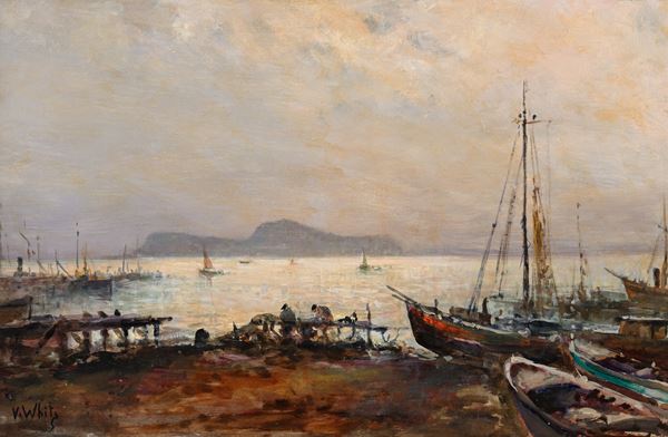 Pescatori e barche a riva con Capri sullo sfondo