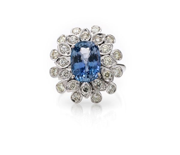 Anello classico in oro, zaffiro e brillanti