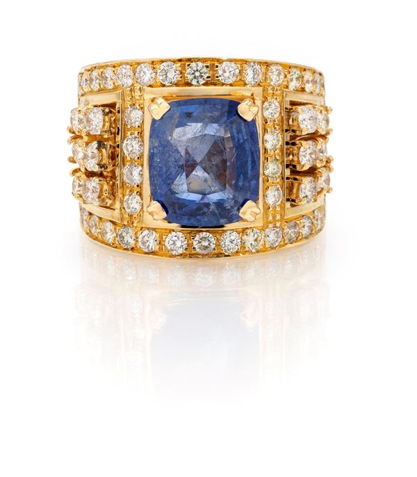 Grande anello a fascia in oro, zaffiro e brillanti