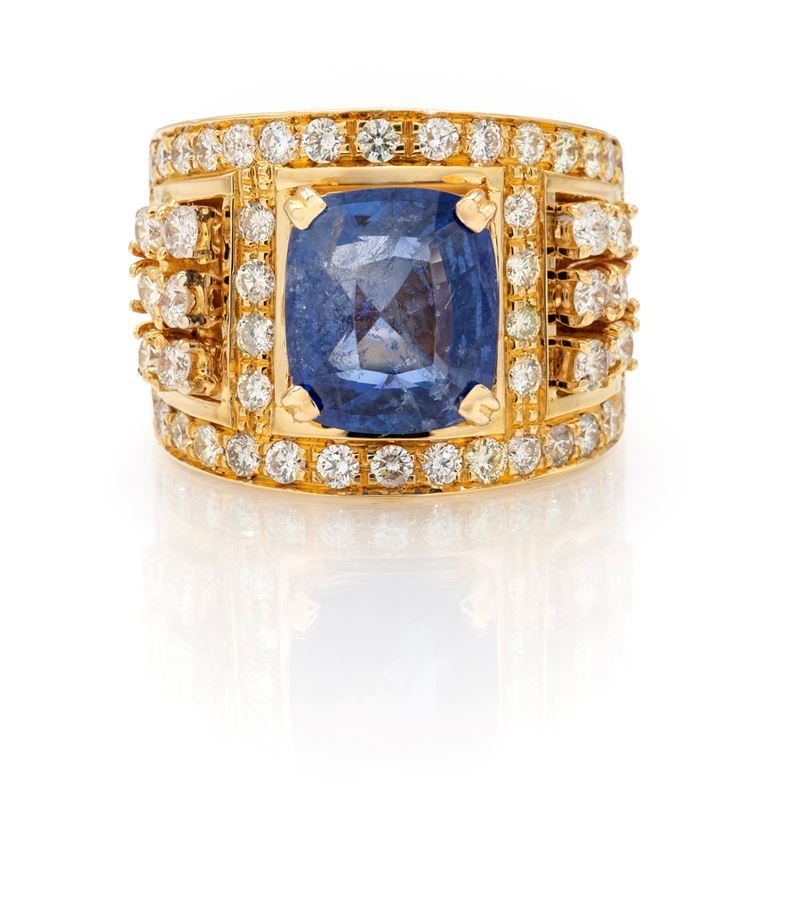 Grande anello a fascia in oro, zaffiro e brillanti