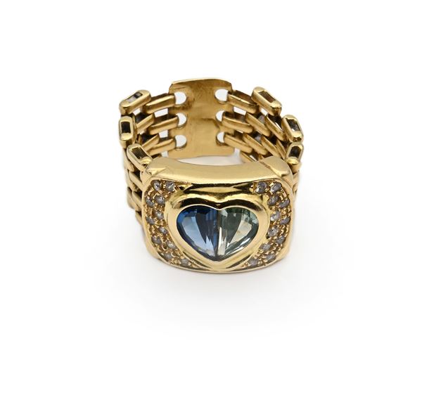 Anello in oro, topazio, peridoto e brillanti