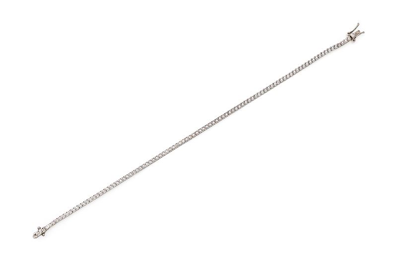 Bracciale tennis in oro bianco 750/000 e diamanti, diamanti rotondi brillanti ct 1 ca., lunghezza...