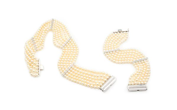 Parure di collier de chien e bracciale in oro perle e brillanti