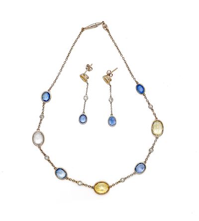 Faraone, Parure in oro con collana e orecchini in oro bianco 750/000, zaffiri multicolor e brilla...