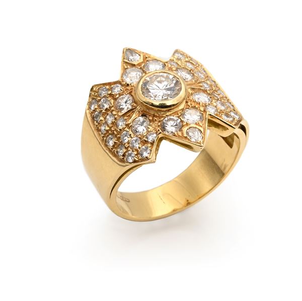 Anello in oro, brillante solitario e brillanti