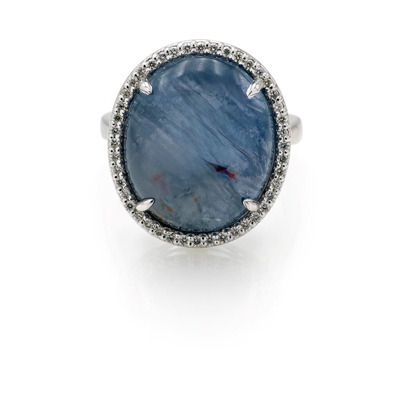 Anello in platino, zaffiro asteria e diamanti