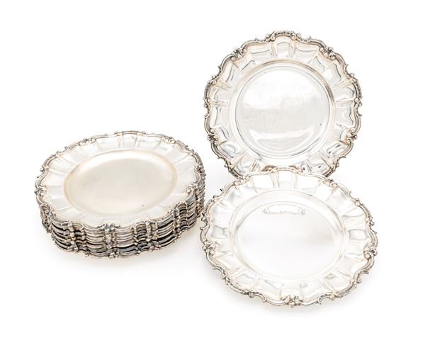 Dodici piatti da dolce in argento 800/000
