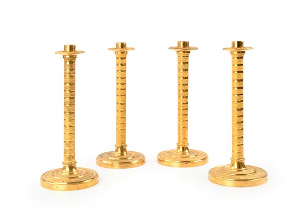 Quattro candelieri Carlo X in bronzo dorato, prima metà del XIX secolo