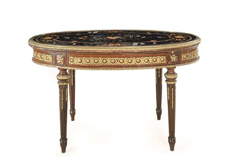 Tavolo da centro, piano ovale in marmi policromi e pietre dure con fregio e finiture in bronzo, f...