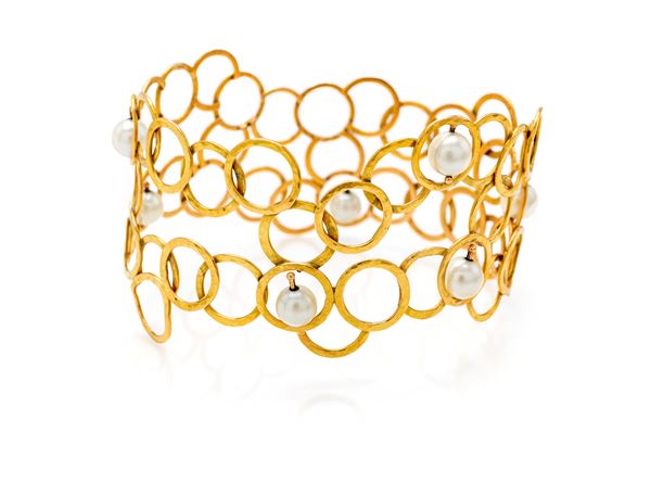 Bracciale rigido in oro e perle