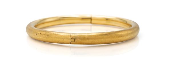 Bracciale rigido in oro liscio e satinato