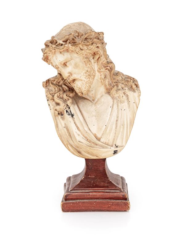 Busto di Cristo in bisquit su piedistallo dipinto ad imitazione del legno