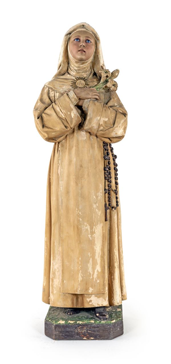 Scultura in terracotta raffigurante la Beata Imelda Lambertini