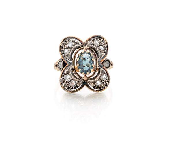 Anello in oro, argento, zaffiro e diamanti
