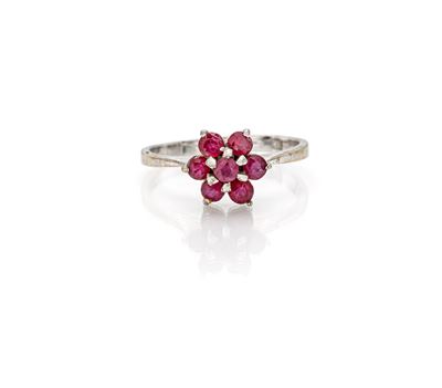 Anello in oro bianco 750/000 con rubini a fiore (mis. 14)