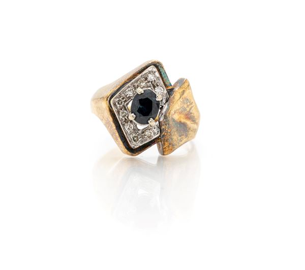 Anello in oro, zaffiro e diamanti